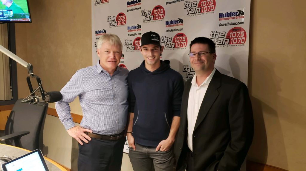 Curt Cavin, Alexander Rossi, and Kevin Lee pose for a picture in-studio
