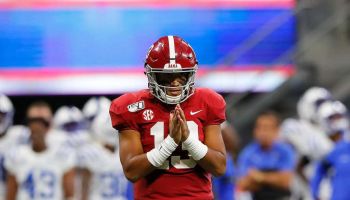 Tua Tagovailoa #13 of the Alabama Crimson Tide reacts after passing for a touchdown in the second half against the Duke Blue Devils at Mercedes-Benz Stadium