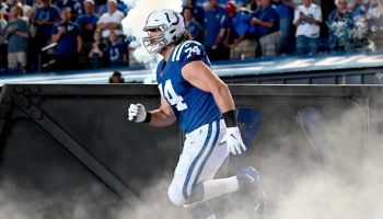 Colts left tackle Anthony Castonzo runs out of the tunnel at Lucas Oil Stadium.