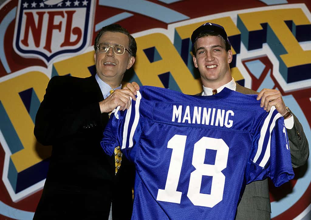 Peyton Manning, quarterback from University of Tennessee. Selected as a first overall draft choice by the Indianapolis Colts is announced and introduced by NFL Commissioner Paul Tagliabue at the 1998 NFL Draft