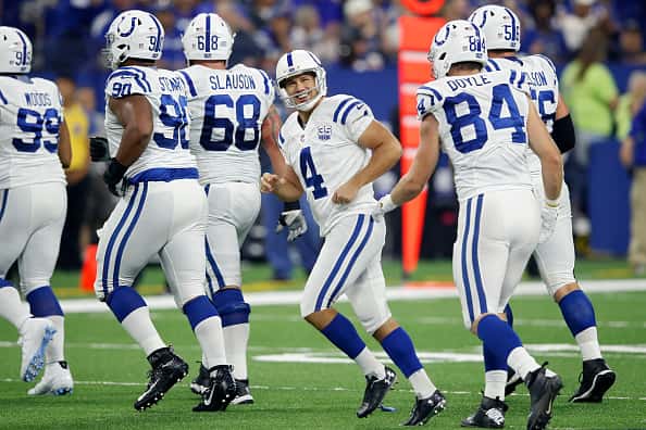 Adam Vinatieri #4 of the Indianapolis Colts reacts after kicking a 57-yard field goal against the Baltimore Ravens