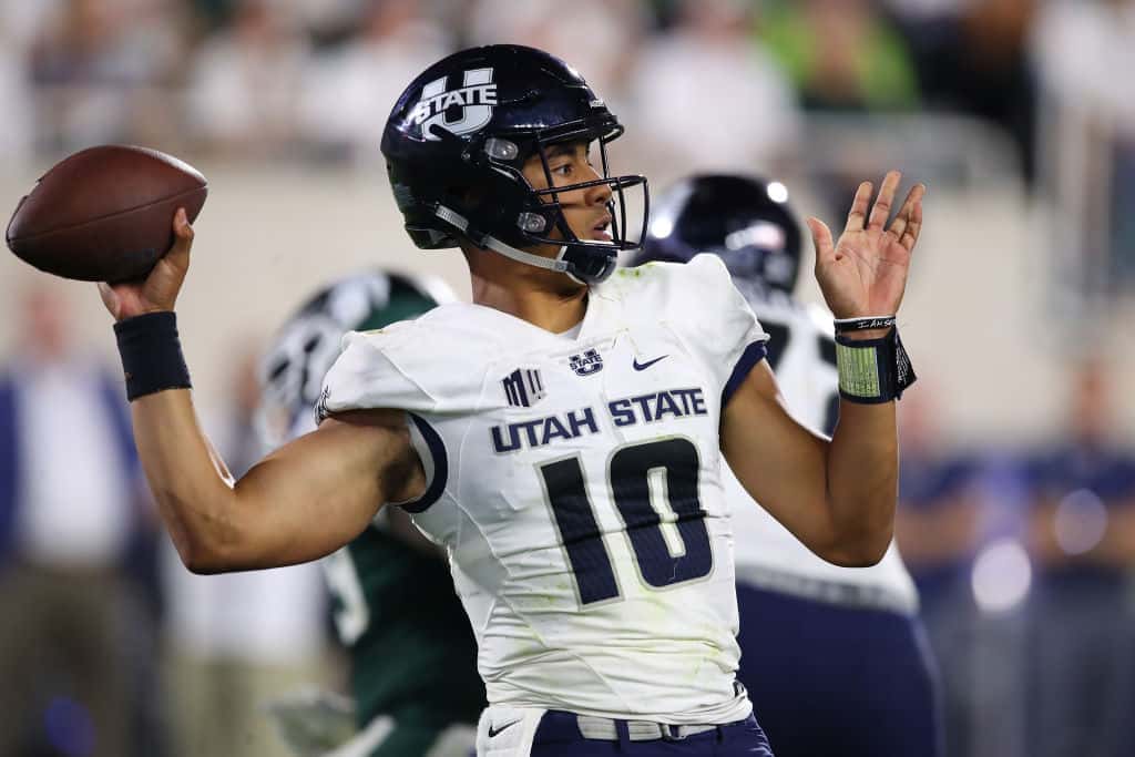 Jordan Love #10 of the Utah State Aggies throws a second half pass while playing the Michigan State Spartans