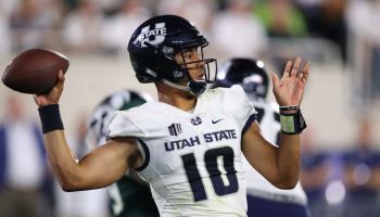 Jordan Love #10 of the Utah State Aggies throws a second half pass while playing the Michigan State Spartans