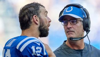 Colts head coach Frank Reich and quarterback Andrew Luck talk on the sideline during a 2018 game at Lucas Oil Stadium.