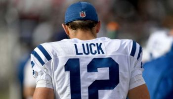 Colts quarterback Andrew Luck walks down the sideline during a game in 2018.