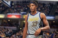 Myles Turner gets ready for a play while rocking the Pacers City Uniforms