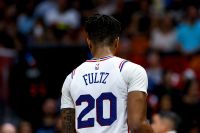 Markelle Fultz is show with his back to the camera, in-game for the Sixers