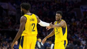 Pacers guard Tyreke Evans high-fives forward Thaddeus Young in a December 2018 game.