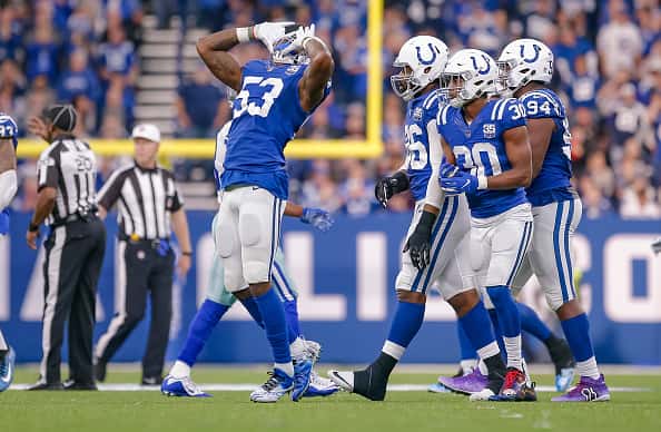 Darius Leonard #53 of the Indianapolis Colts reacts after a play during the game against the Dallas Cowboys