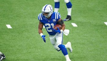 Colts running back Nyheim Hines runs the football in a 2018 game at Lucas Oil Stadium.