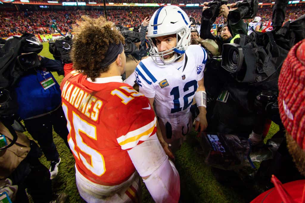 Colts quarterback Andrew Luck shakes Chiefs quarterback Patrick Mahomes hand after a January 2019 game.