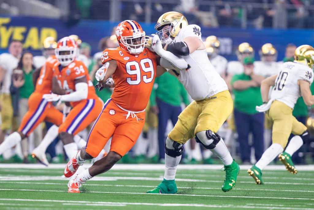 Clemson defensive end Clelin Ferrell tries to get past the Notre Dame offensive line in December 2018.