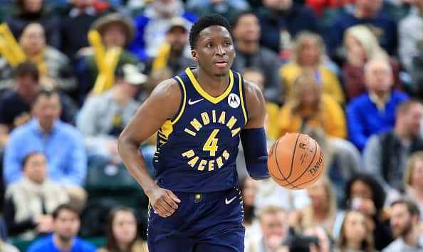Victor Oladipo #4 of the Indiana Pacers dribbles the ball against of the Charlotte Hornets at Bankers Life Fieldhouse