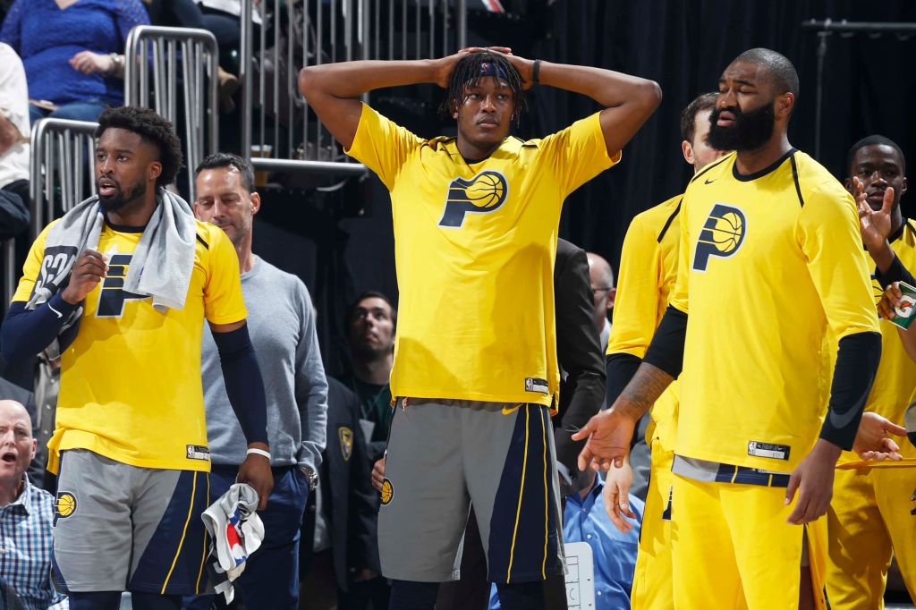 Myles Turner and the Pacers bench reacts to a call against the Celtics