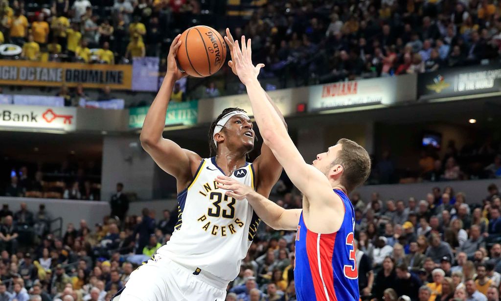 #33 Myles Turner of the Pacers drives to the basket against Jon Leuer of the Detroit Pistons