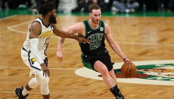 Gordon Hayward of the Boston Celtics drives against Tyreke Evans of the Indiana Pacers