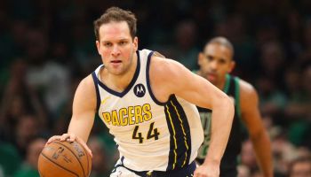 Pacers small forward Bojan Bogdanovic pushes the ball forward in a game against the Celtics in 2019.