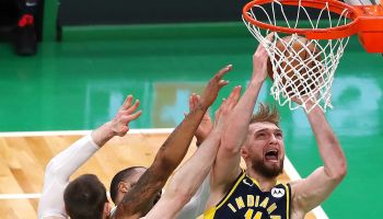Domantas Sabonis #11 of the Indiana Pacers takes a shot over Aron Baynes #46 of the Boston Celtics during the second quarter of