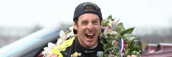 Simon Pagenaud of France, driver of the #22 Menards celebrates after winning the 103rd running of the Indy 500.