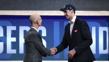 Goga Bitadze poses with NBA Commissioner Adam Silver after being drafted with the 18th overall pick by the Indiana Pacers