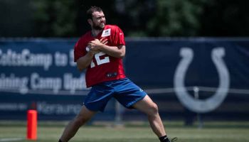 Indianapolis Colts quarterback Andrew Luck (12) runs through a drill during the Indianapolis Colts training camp practice
