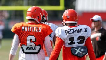 Browns quarterback Baker Mayfield walks onto the practice field with wide receiver Odell Beckham in 2019.
