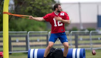 Colts quarterback Andrew Luck stretches before a 2019 Training Camp practice at Grand Park.