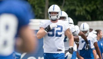Margus Hunt #92 of the Indianapolis Colts runs through drills at the Colts' training camp at Grand Park on July 25, 2019 in West