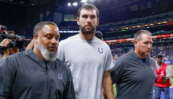Colts Quarterback Andrew Luck walks off the field upon retiring from the NFL.