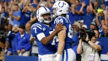 Jacoby Brissett #7 and Jack Doyle #84 of the Indianapolis Colts celebrates after a touchdown against the Raiders.