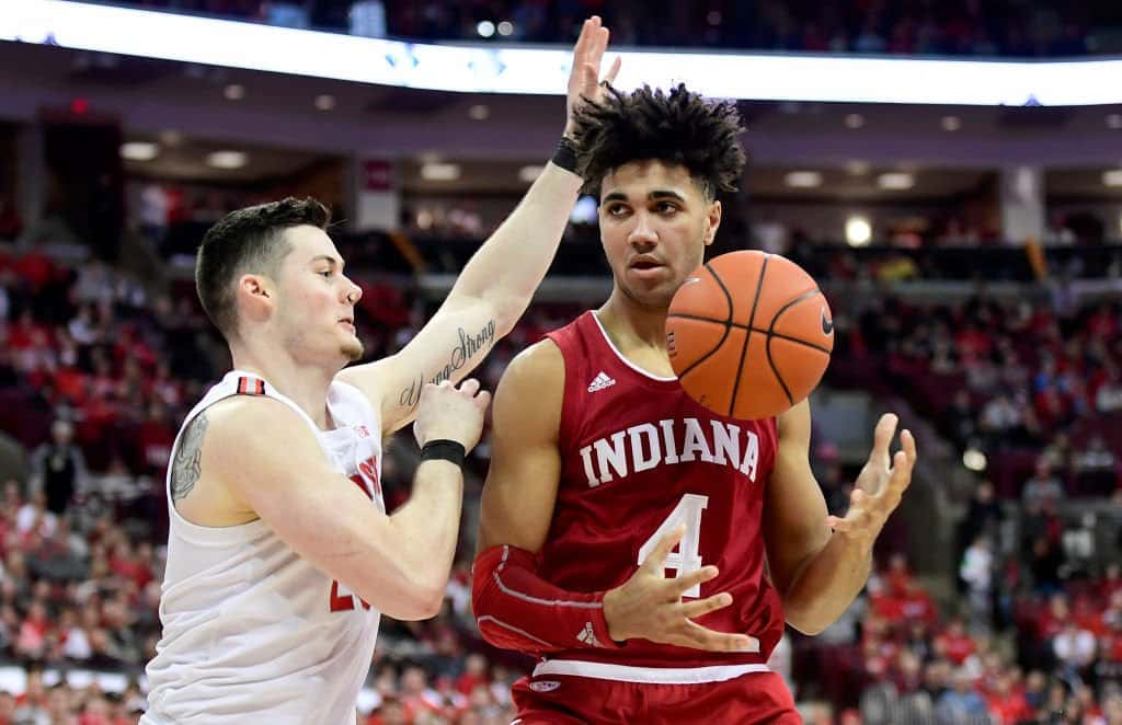 Trayce Jackson-Davis #4 of the Indiana Hoosiers catches the ball while being guarded by Kyle Young