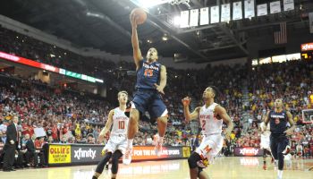 Malcolm Brogdon #15 of the Virginia Cavaliers drives to the basket during a college basketball game against the Maryland Terrapi