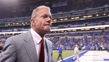 Colts Owner Jim Irsay walks off the field before a game at Lucas Oil Stadium.