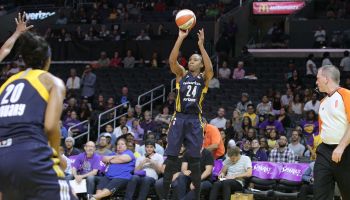 Tamika Catchings, #24 of the Indiana Fever shoots a 3 pointer