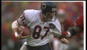 Wide receiver Tom Waddle of the Chicago Bears runs with the ball during a playoff game against the San Francisco