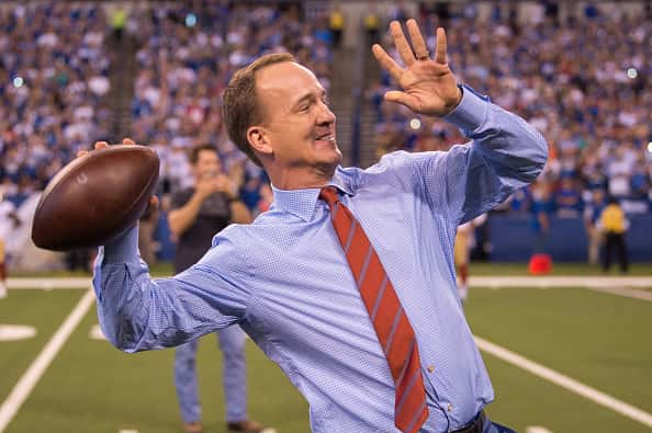 Peyton Manning throws one last touchdown pass to Marvin Harrison during the ceremony retiring his number at Lucas Oil Stadium.