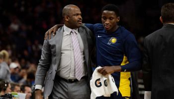 Pacers guard Victor Oladipo puts his arm around head coach Nate McMillan in the 2017-18 season.