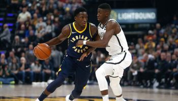 Pacers guard Victor Oladipo tries to drive past Brooklyn guard Caris LeVert.