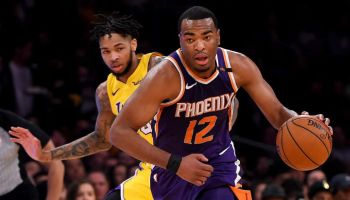Former Suns forward T.J. Warren brings the ball up in a 2018-18 game against the Lakers.