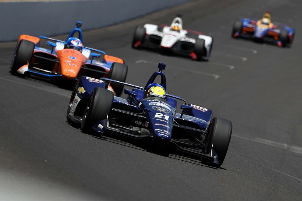 Spencer Pigot, driver of the #21 Preferred Freezer Service Chevrolet, races during the 102nd Indianapolis 500