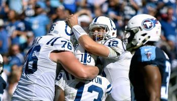 T.Y. Hilton #13 of the Indianapolis Colts is congratulated by teammates Joe Reitz #76 and Andrew Luck #12 after scoring a TD