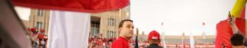 Head Basketball Coach Archie Miller prepares to run out onto the field with Indiana Hoosier Head Coach Tom Allen