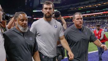 Andrew Luck #12 of the Indianapolis Colts walks off the field following reports of his retirement from the NFL