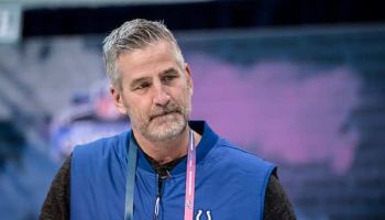 Colts head coach Frank Reich stands at the podium at the 2019 NFL Combine.