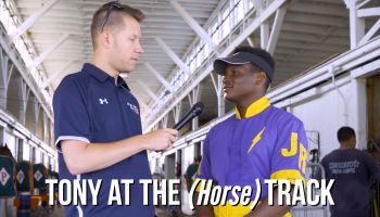 Tony D talks with a horse driver at the Indiana State Fairgrounds