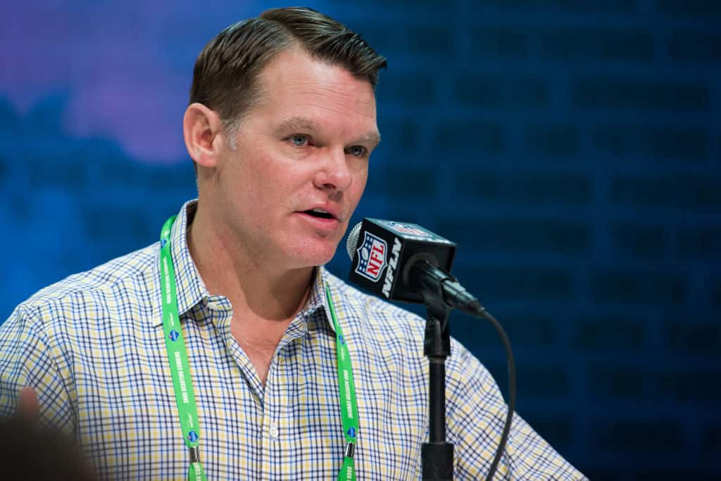 Colts GM Chris Ballard talks at the podium during the 2020 Combine.