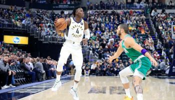 Pacers guard Victor Oladipo dibbles in a 2020 game against the Celtics.