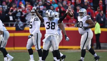 Former Raiders cornerback T.J. Carrie celebrates after a big play.