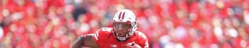 Wisconsin RB-Jonathan Taylor runs in the open field.