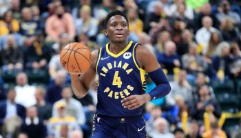 Pacers guard Victor Oladipo brings up the ball in a game.